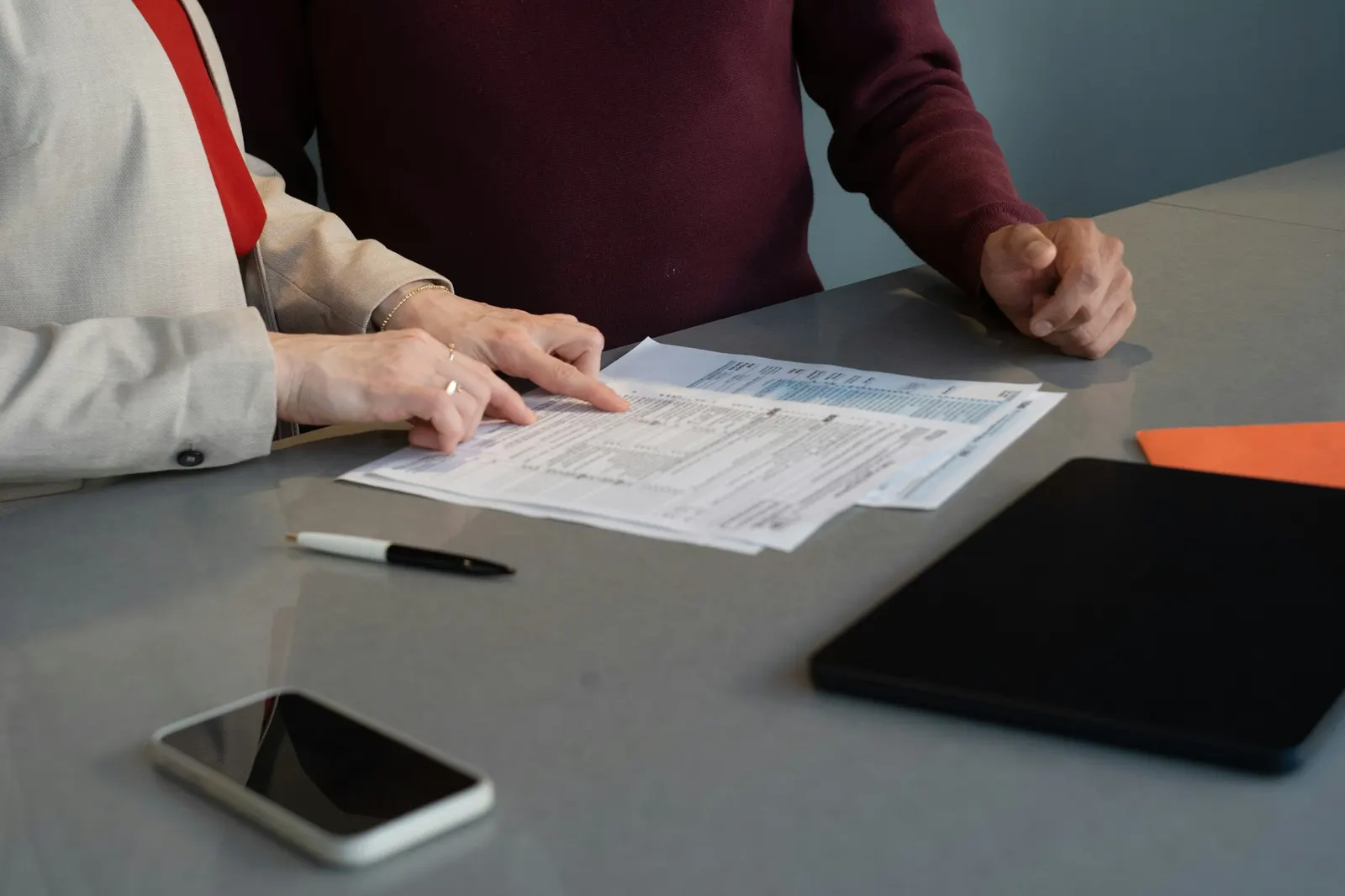 An accounting and fiduciary firm website showing services, the team, and a secure client area login