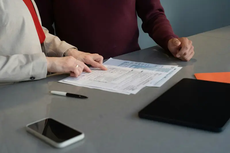 An accounting and fiduciary firm website showing services, the team, and a secure client area login