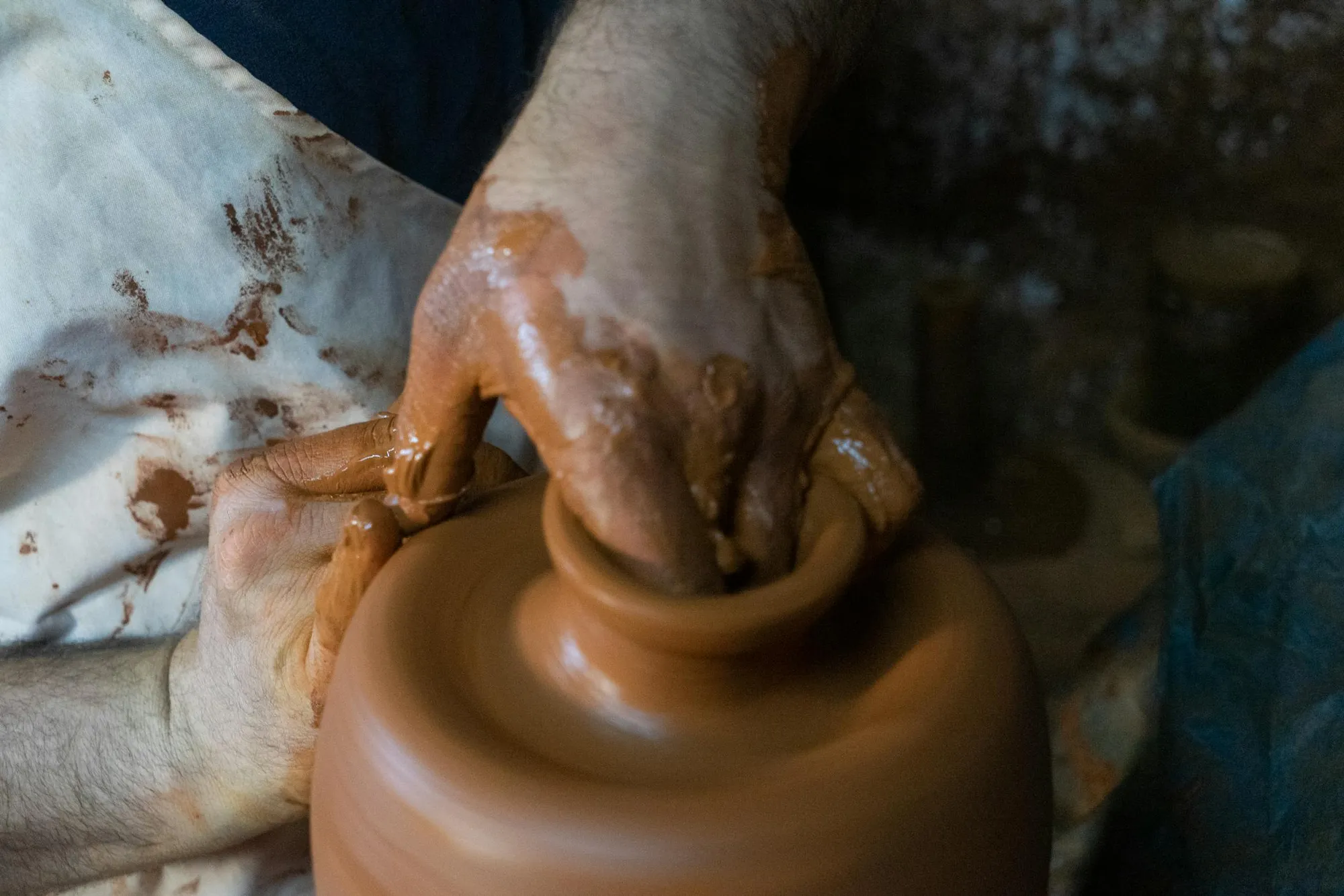 Close-up of hands crafting a bespoke piece