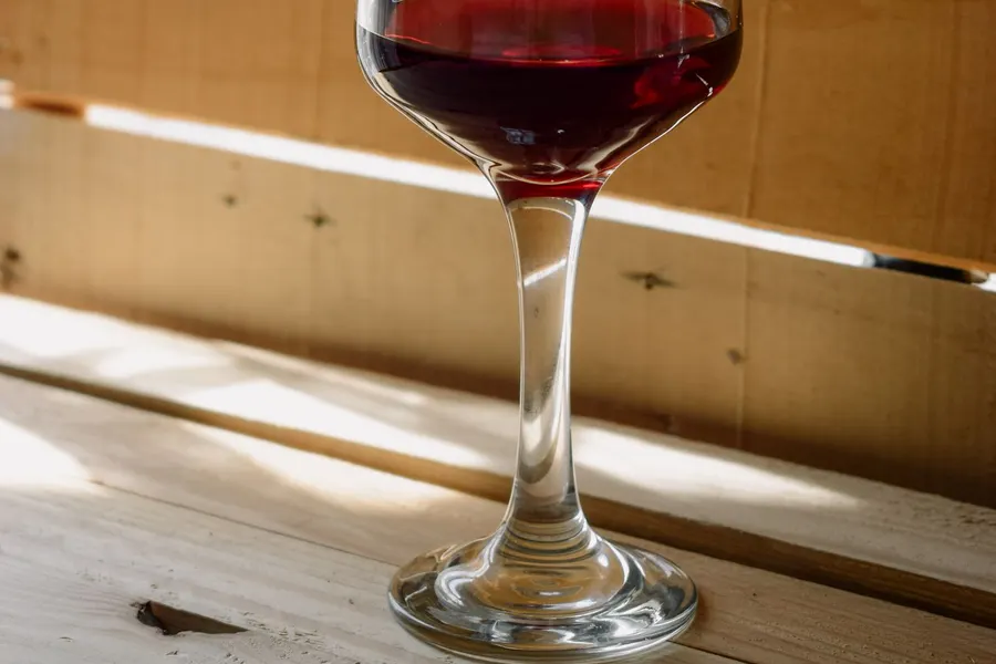 A ceramic boccalino full of red Ticino Merlot