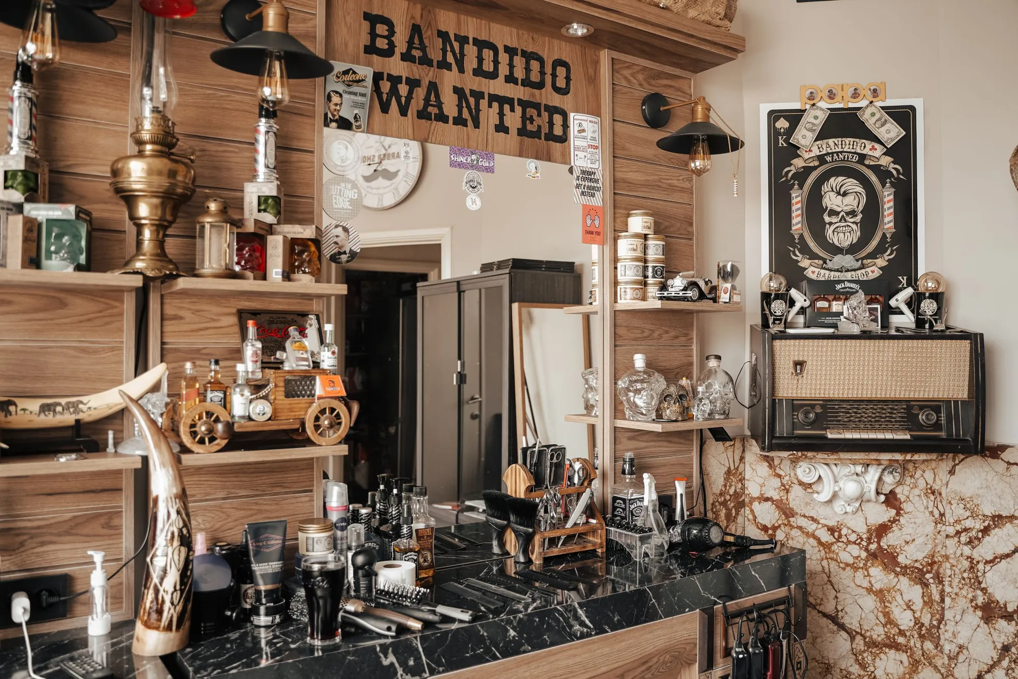Detail of the barbershop interior with chairs and mirrors