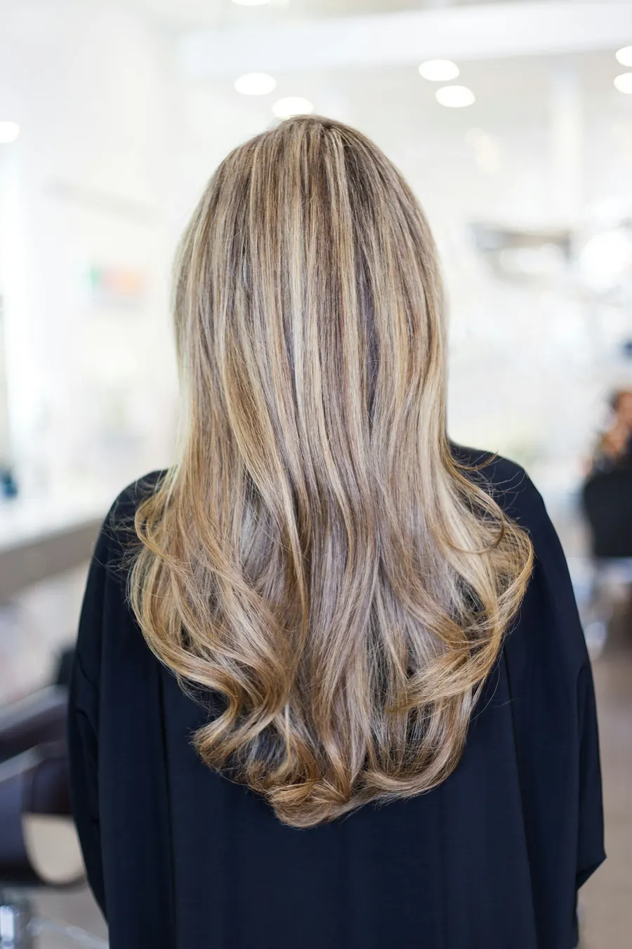 A hair and beauty salon website showing the service menu, prices and an online booking button