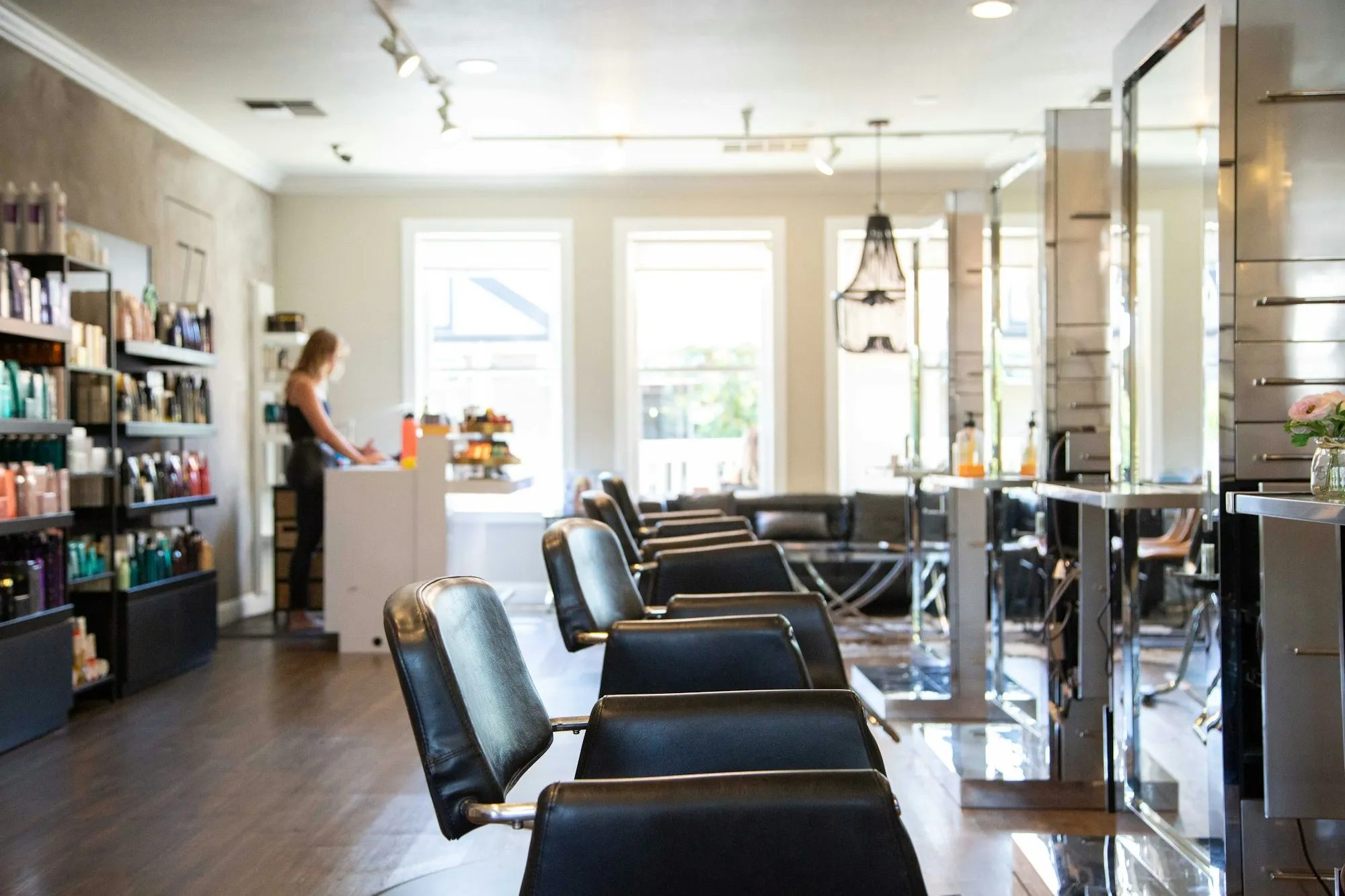 Bright salon interior with chairs and mirrors