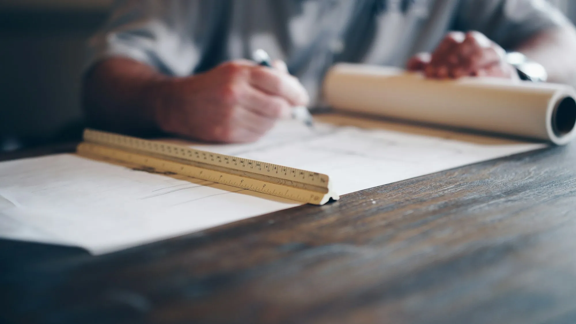 Construction plans and drawings on a table