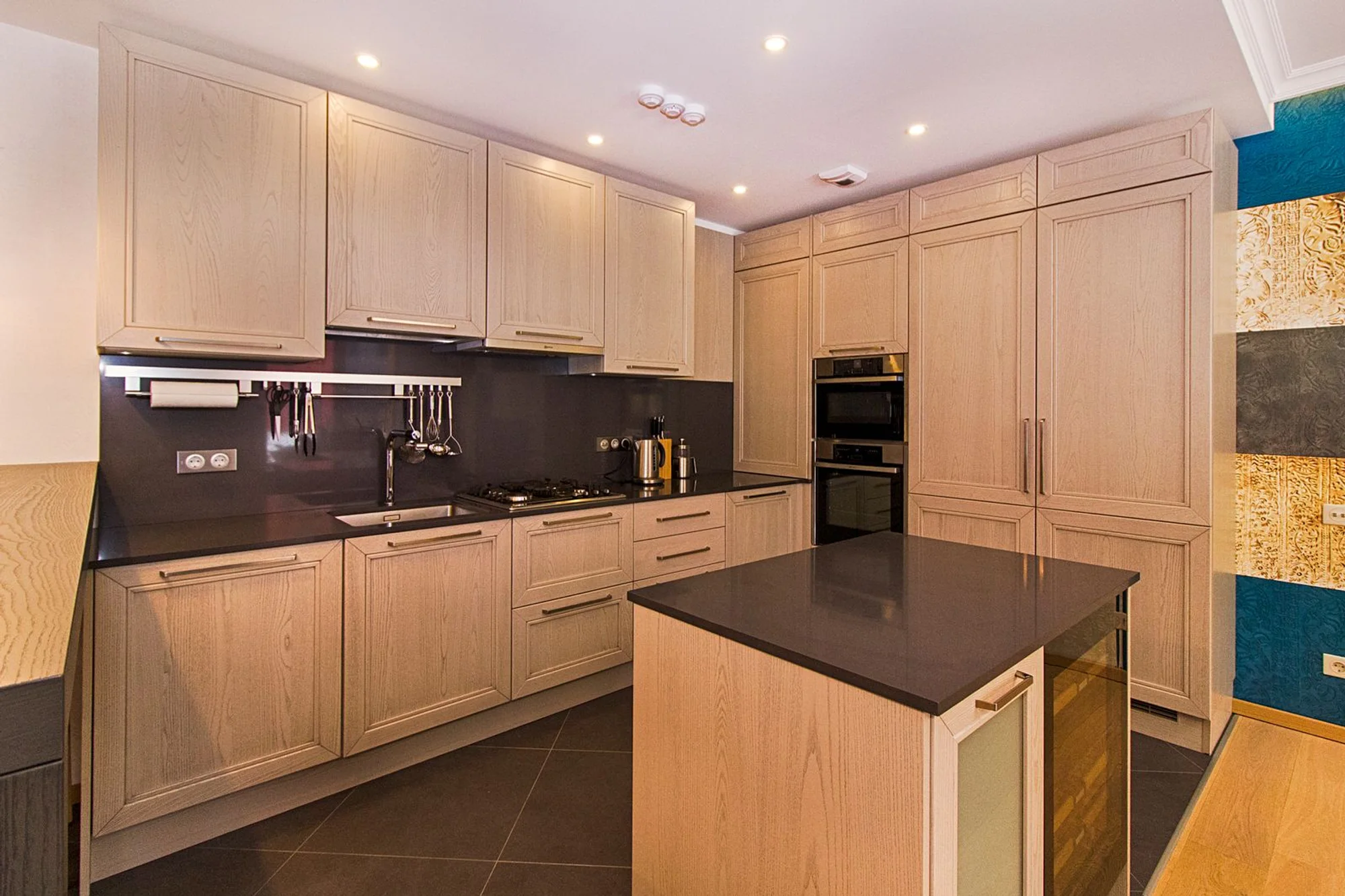 A bespoke solid-oak kitchen with a walnut worktop