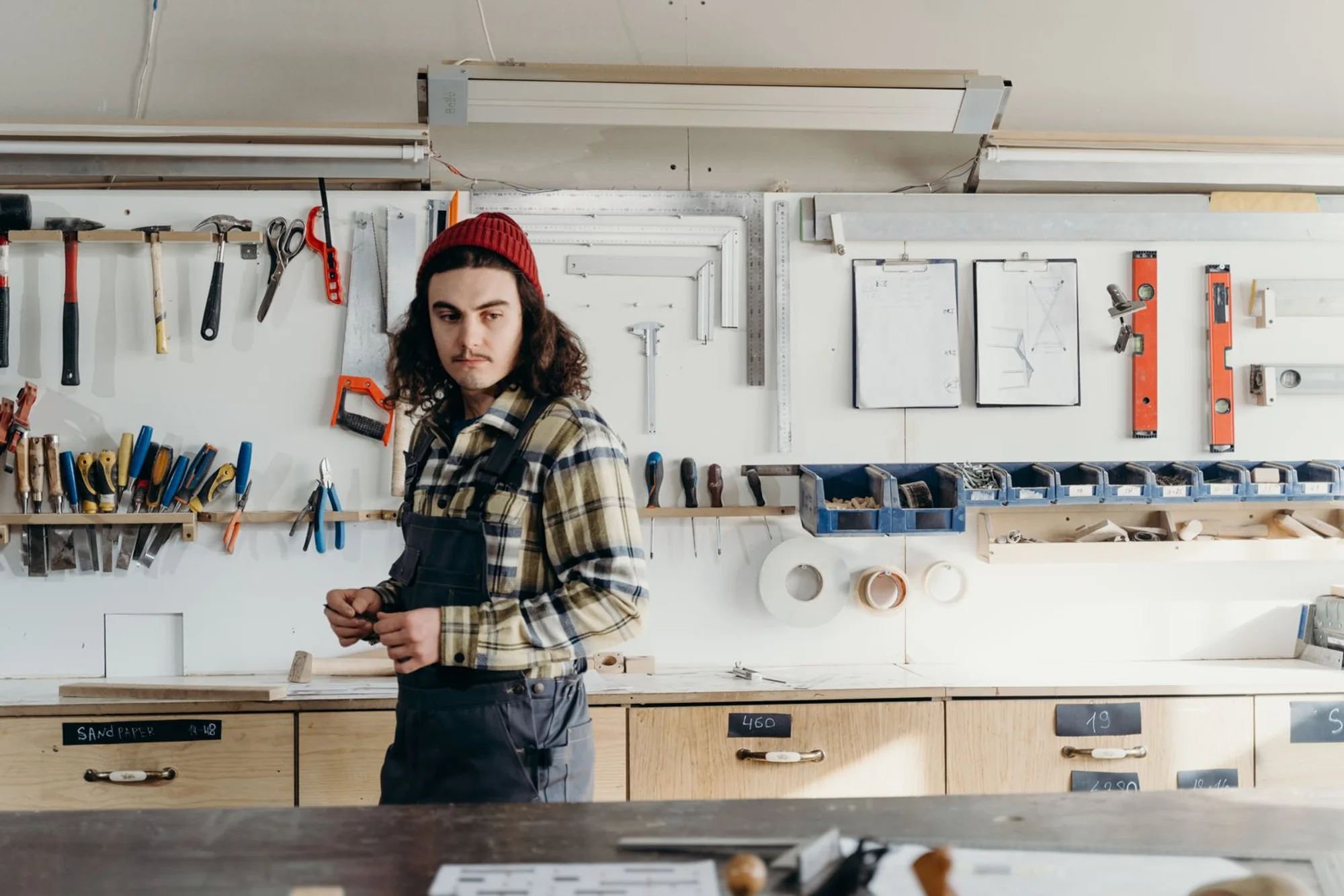 Portrait of the joiner in the workshop