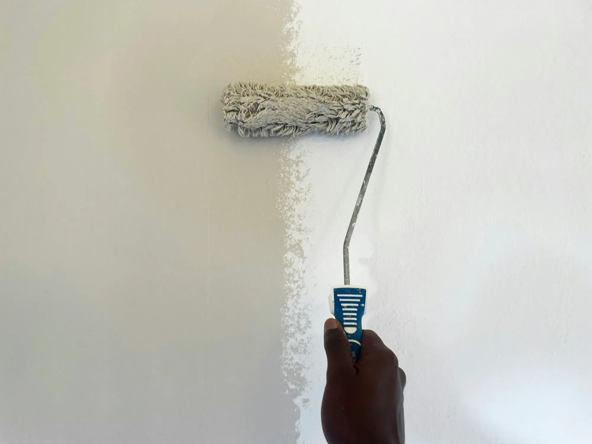 A tall, clean hallway wall
