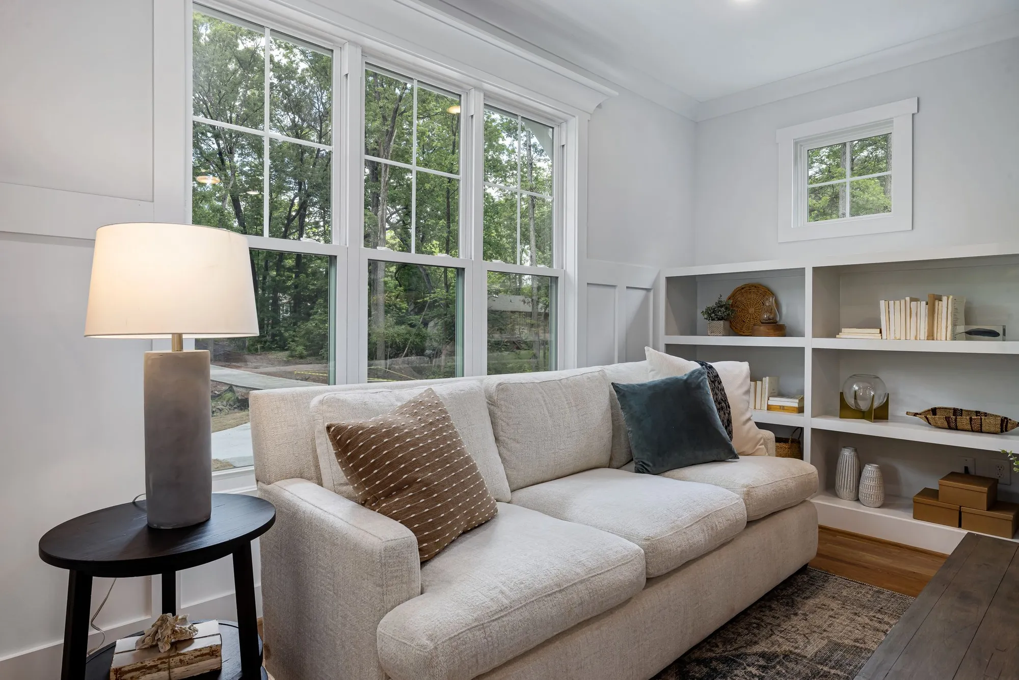 A windows, shutters and shading company website showing an instant quote configurator and a before and after gallery