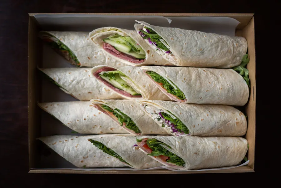 A crispy chicken wrap cut in half